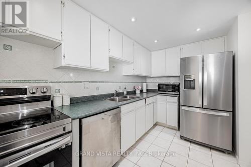 905 - 10 Dean Park Road, Toronto (Rouge), ON - Indoor Photo Showing Kitchen With Stainless Steel Kitchen With Double Sink