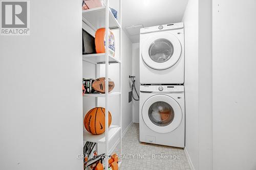 905 - 10 Dean Park Road, Toronto (Rouge), ON - Indoor Photo Showing Laundry Room