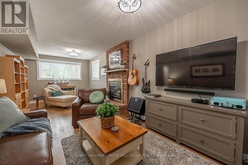 74 Gibbon Drive, Barrie (Letitia Heights), ON - Indoor Photo Showing Living Room With Fireplace