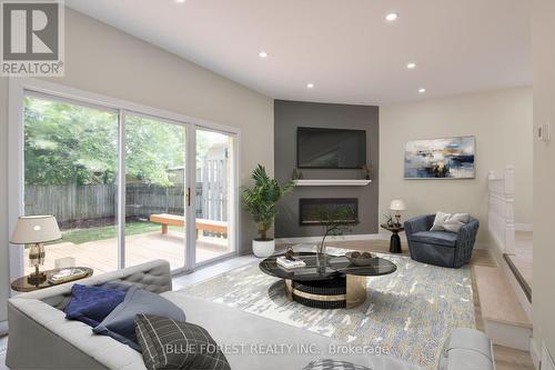 1048 Mahogany Road, London, ON - Indoor Photo Showing Living Room With Fireplace