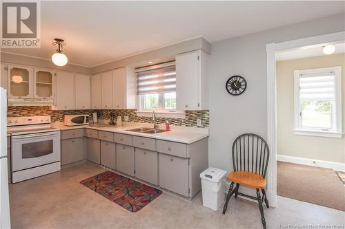 814 113 Route, Inkerman, NB - Indoor Photo Showing Kitchen With Double Sink