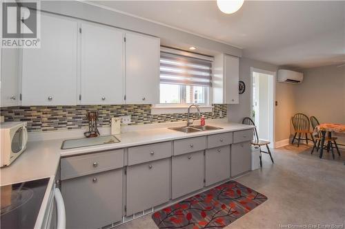 814 113 Route, Inkerman, NB - Indoor Photo Showing Kitchen With Double Sink