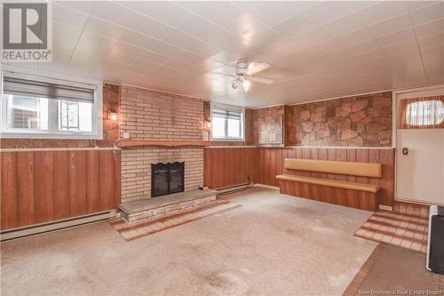 814 113 Route, Inkerman, NB - Indoor Photo Showing Other Room With Fireplace