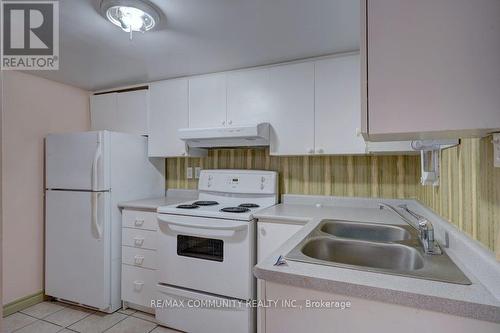 2037 Bur Oak Avenue, Markham (Greensborough), ON - Indoor Photo Showing Kitchen With Double Sink