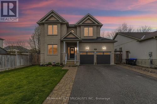 260 Greenwood Drive, Essa, ON - Outdoor With Facade