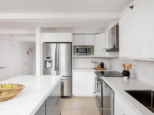 204-525 Logan Ave, Toronto, ON - Indoor Photo Showing Kitchen With Upgraded Kitchen