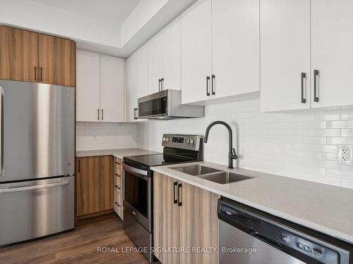 65-60 Fairwood Circ, Brampton, ON - Indoor Photo Showing Kitchen With Stainless Steel Kitchen With Double Sink With Upgraded Kitchen