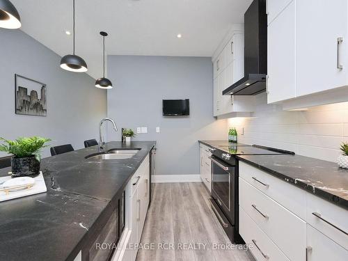 19 Dover Lane, Centre Wellington, ON - Indoor Photo Showing Kitchen With Double Sink With Upgraded Kitchen