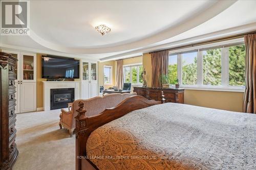 559 Golfview Court, Oakville (Glen Abbey), ON - Indoor Photo Showing Bedroom With Fireplace