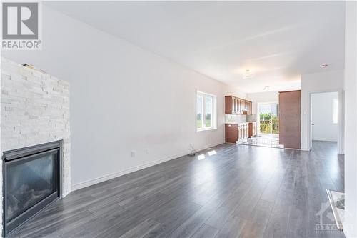 1031 Jacynthe Street, Hawkesbury, ON - Indoor Photo Showing Living Room With Fireplace