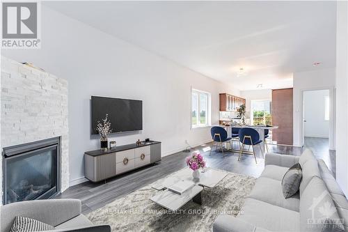 1031 Jacynthe Street, Prescott And Russell, ON - Indoor Photo Showing Living Room With Fireplace