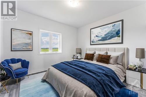 virtually stages master suiite - 1031 Jacynthe Street, Hawkesbury, ON - Indoor Photo Showing Bedroom