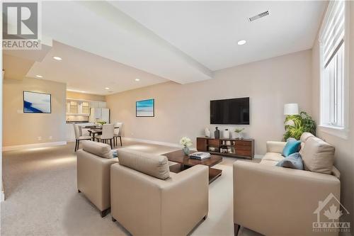 This photo has been virtually staged. - 6373 Radisson Way, Ottawa, ON - Indoor Photo Showing Living Room