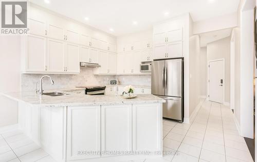 15246 Danby Road, Halton Hills (Georgetown), ON - Indoor Photo Showing Kitchen With Double Sink