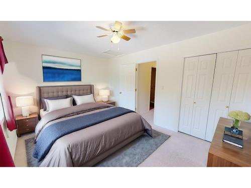 101 - 4835 Radium Boulevard, Radium Hot Springs, BC - Indoor Photo Showing Bedroom