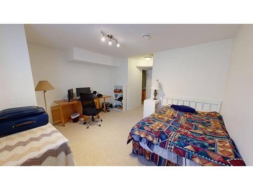 101 - 4835 Radium Boulevard, Radium Hot Springs, BC - Indoor Photo Showing Bedroom