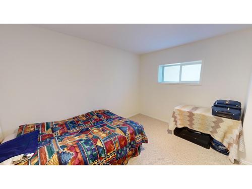 101 - 4835 Radium Boulevard, Radium Hot Springs, BC - Indoor Photo Showing Bedroom