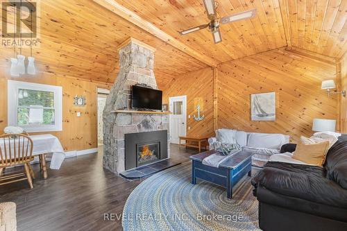 135 Centre Beach Road, Tiny, ON - Indoor Photo Showing Living Room With Fireplace