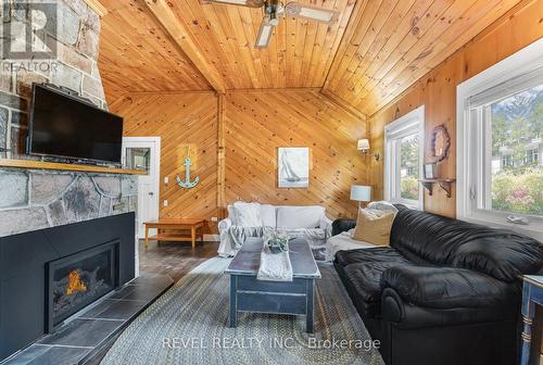 135 Centre Beach Road, Tiny, ON - Indoor Photo Showing Living Room With Fireplace