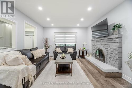 44 Abelard Avenue, Brampton, ON - Indoor Photo Showing Living Room With Fireplace