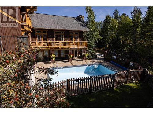 4559 Timberline  Crescent Unit# 415, Fernie, BC - Outdoor With In Ground Pool With Deck Patio Veranda