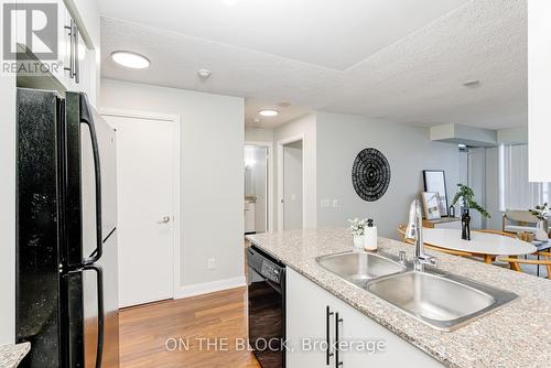 950 - 25 Viking Lane, Toronto (Islington-City Centre West), ON - Indoor Photo Showing Kitchen With Double Sink