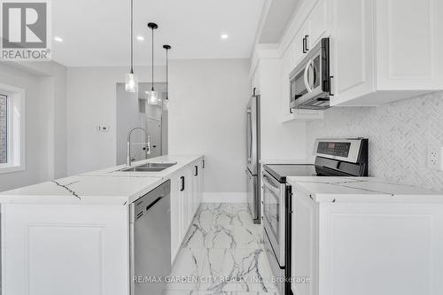 86 Beland Avenue N, Hamilton (Mcquesten), ON - Indoor Photo Showing Kitchen With Double Sink