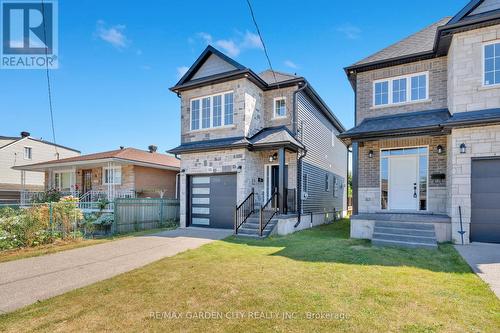 86 Beland Avenue N, Hamilton (Mcquesten), ON - Outdoor With Facade