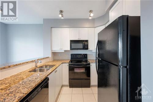 570 Laurier Avenue W Unit#1605, Ottawa, ON - Indoor Photo Showing Kitchen With Double Sink