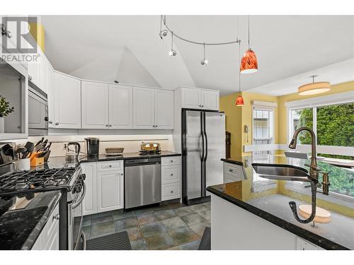 773 Siwash Court, Kelowna, BC - Indoor Photo Showing Kitchen With Stainless Steel Kitchen With Double Sink With Upgraded Kitchen