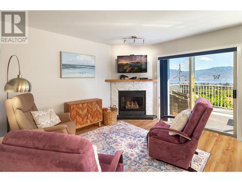 2613 Copper Ridge Drive, West Kelowna, BC - Indoor Photo Showing Living Room With Fireplace