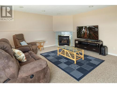 2613 Copper Ridge Drive, West Kelowna, BC - Indoor Photo Showing Living Room With Fireplace