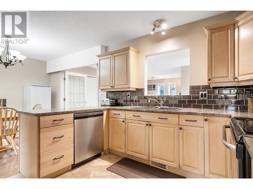 720 Princess Road, Kelowna, BC - Indoor Photo Showing Kitchen With Double Sink