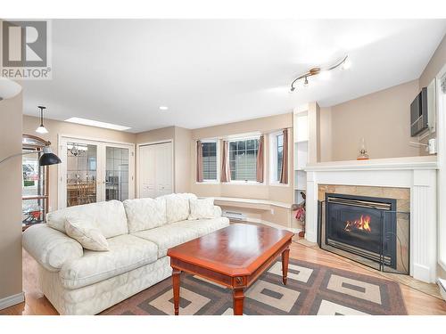 720 Princess Road, Kelowna, BC - Indoor Photo Showing Living Room With Fireplace