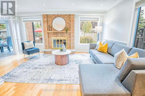 6 Mcarthur Heights, Brampton, ON - Indoor Photo Showing Living Room With Fireplace