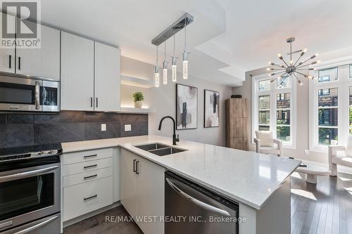 7 - 8171 Kipling Avenue, Vaughan (West Woodbridge), ON - Indoor Photo Showing Kitchen With Stainless Steel Kitchen With Double Sink With Upgraded Kitchen