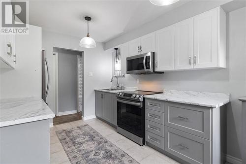 All new SS appliances in '22 - 323 Main Street W Unit#302, Merrickville, ON - Indoor Photo Showing Kitchen