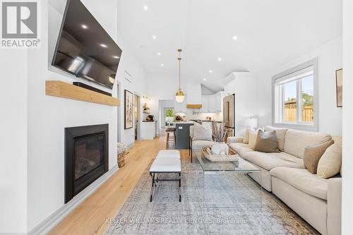 131 Maple Avenue, Georgina (Sutton & Jackson'S Point), ON - Indoor Photo Showing Living Room With Fireplace