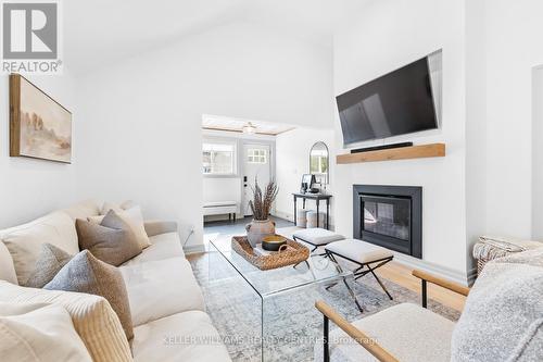 131 Maple Avenue, Georgina (Sutton & Jackson'S Point), ON - Indoor Photo Showing Living Room With Fireplace