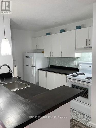 104 - 23 Dawson Drive, Collingwood, ON - Indoor Photo Showing Kitchen