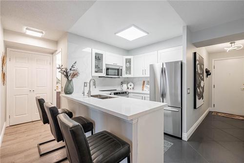 25 Kingsbridge Garden Circle|Unit #1021, Mississauga, ON - Indoor Photo Showing Kitchen With Double Sink