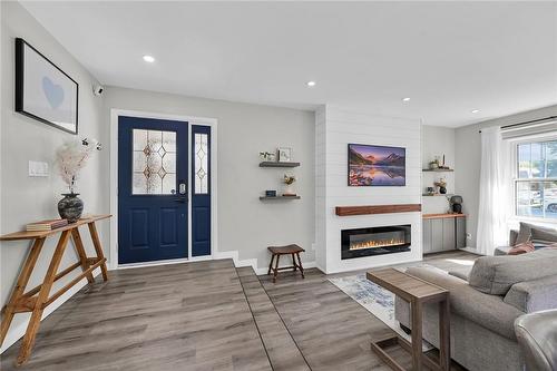 23 Ameer Drive, St. Catharines, ON - Indoor Photo Showing Living Room With Fireplace