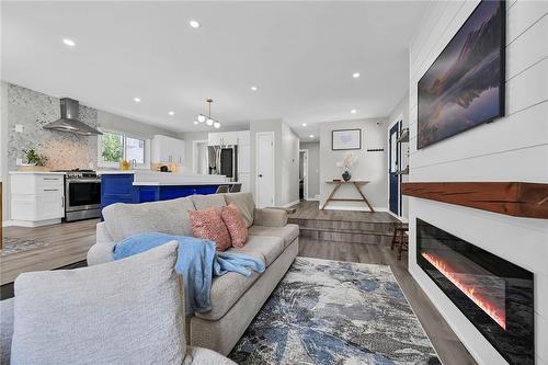 23 Ameer Drive, St. Catharines, ON - Indoor Photo Showing Living Room With Fireplace