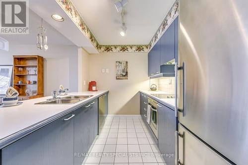 403 - 50 Eglinton Avenue W, Mississauga, ON - Indoor Photo Showing Kitchen With Double Sink