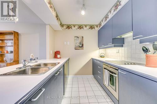 403 - 50 Eglinton Avenue W, Mississauga, ON - Indoor Photo Showing Kitchen With Double Sink