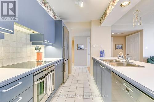 403 - 50 Eglinton Avenue W, Mississauga, ON - Indoor Photo Showing Kitchen With Double Sink