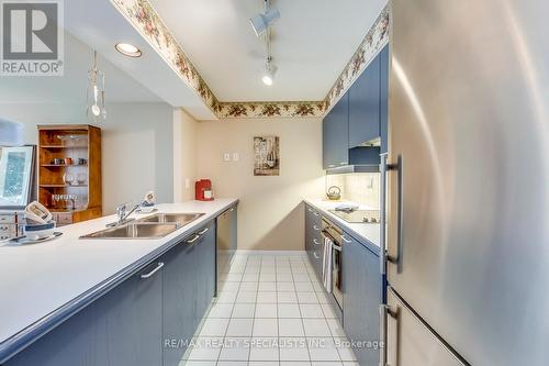 403 - 50 Eglinton Avenue W, Mississauga (Hurontario), ON - Indoor Photo Showing Kitchen With Double Sink