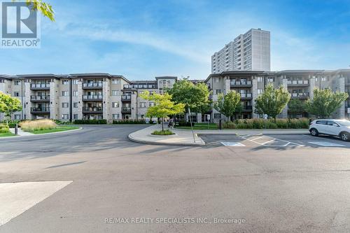 319 - 570 Lolita Gardens, Mississauga (Mississauga Valleys), ON - Outdoor With Balcony With Facade