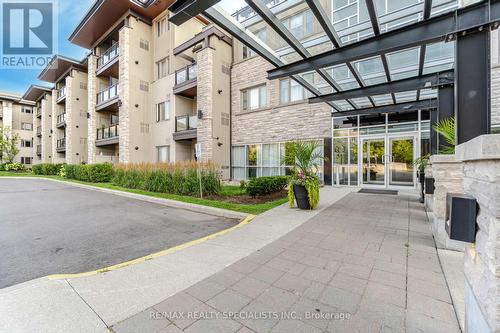 319 - 570 Lolita Gardens, Mississauga (Mississauga Valleys), ON - Outdoor With Balcony With Facade