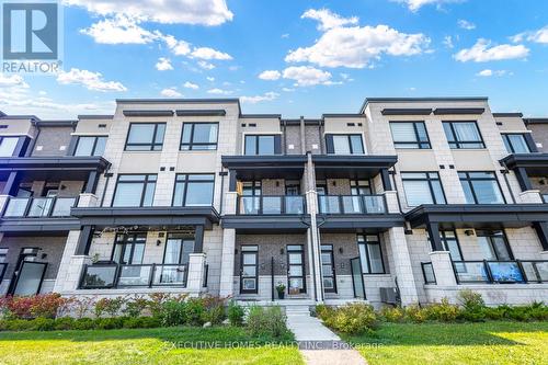 407 - 2550 Castlegate Crossing, Pickering, ON - Outdoor With Balcony With Facade